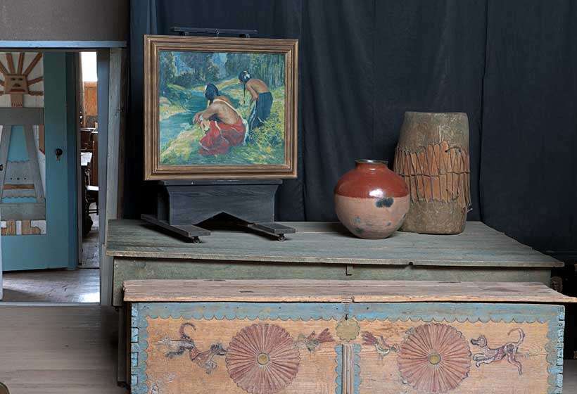 Couse’s model platform displaying one of his paintings.