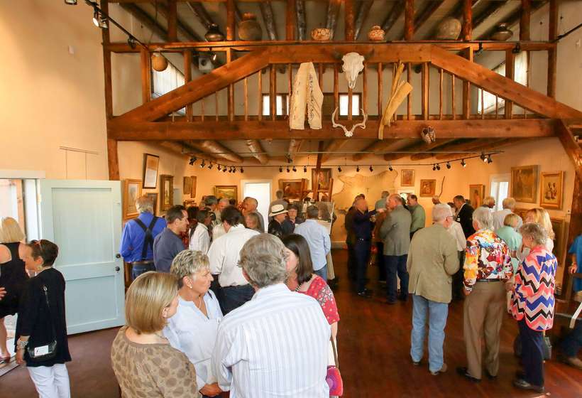 2017 Opening attendees enjoy the restored space and the exhibition "J.H. Sharp Studio: The Life and Work of an American Legend."