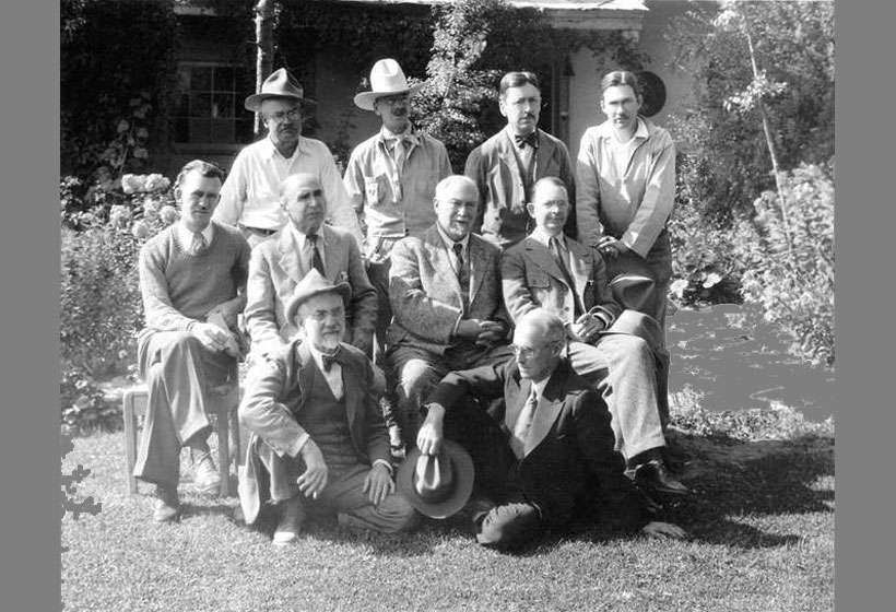 Former members of the Taos Society of Artists photographed by C.E. Lord in the Couse garden, 1932.  Back row: Ufer, Dunton, Higgins, Adams. Seated: Hennings, Phillips, Couse, Berninghaus. Front row: Sharp; Blumenschein. Missing: Critcher and Rolshoven.