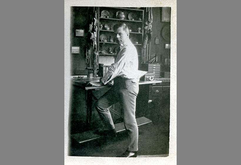 Kibbey Couse at his drafting table, around 18 years old.